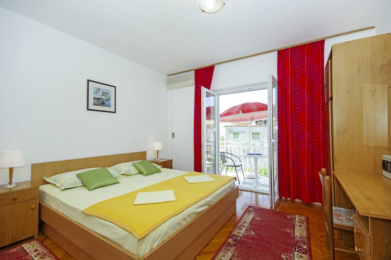 Spavaća soba u Apartmanu 4+2